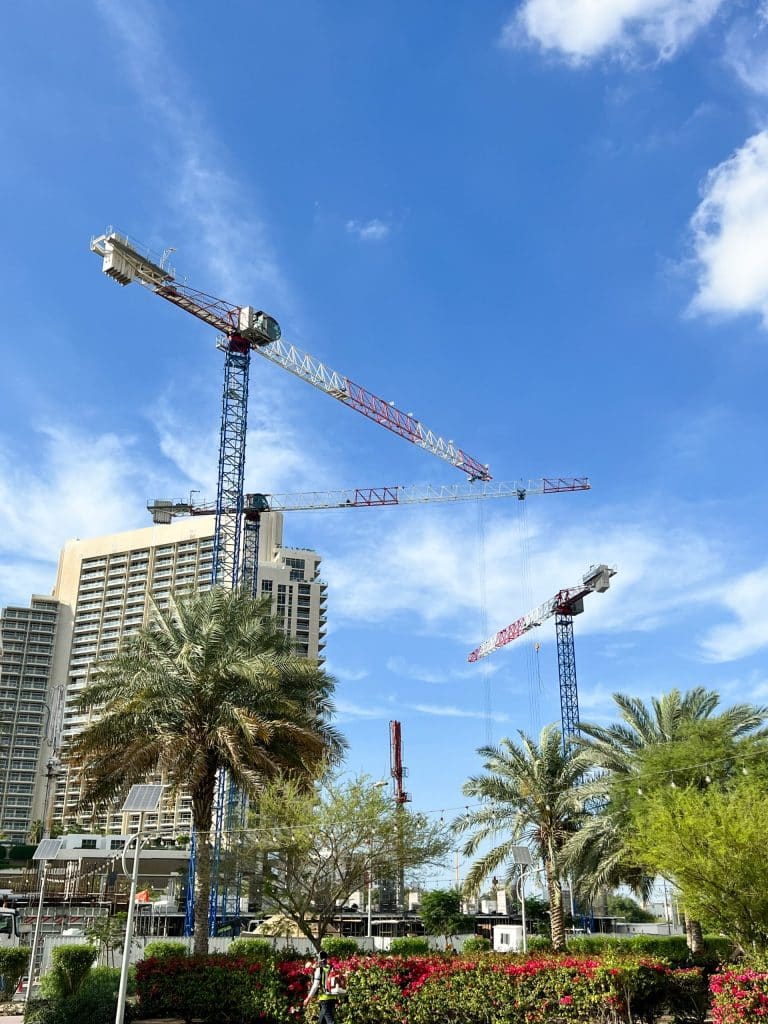 Three Raimondi MRT159 Flat-Top Tower Cranes For The Construction Of New Dubai High Rise 