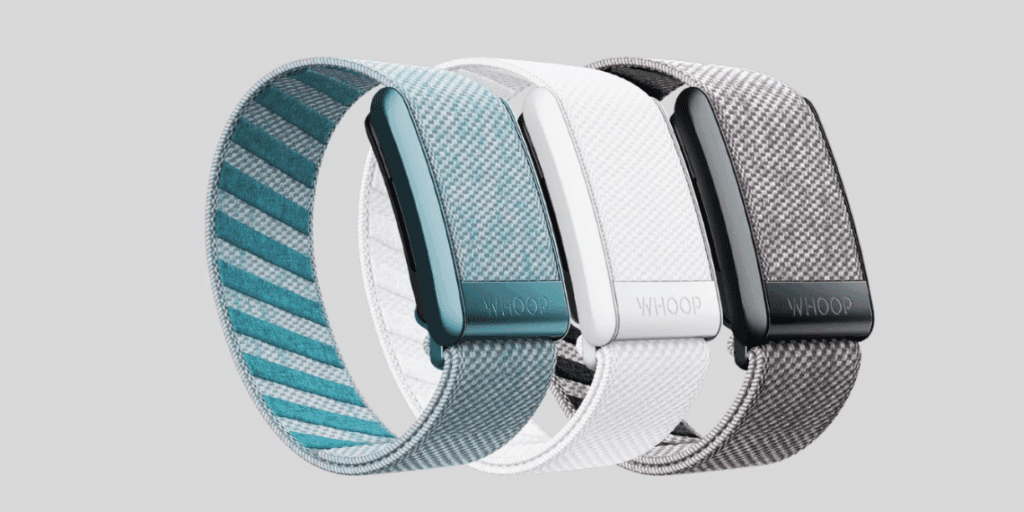 WHOOP wearable device displaying real-time health and performance metrics on its companion app.