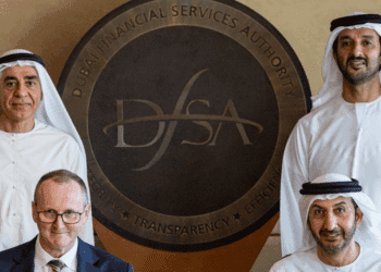Standing behind, H.E. Abdulla Bin Touq Al Marri, Minister of Economy and Tourism (right), and Fadel Al Ali, Chairman, Dubai Financial Services Authority (DFSA) (left) witnessed the signing of the MoU. Seated in front, H.E. Abdullah Ahmed Mohammed Al Saleh, Undersecretary of the Ministry of Economy and Tourism (right), and Mark Steward, Chief Executive, DFSA (left) signed the MoU to strengthen regulatory cooperation on the oversight of auditors.