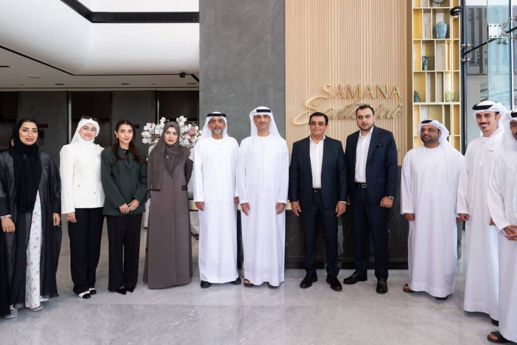A group photo of Samana Developers' Management Team with Majid Saqr Abdullah Al Marri - CEO of the Real Estate Registration Sector at the Dubai Land Department